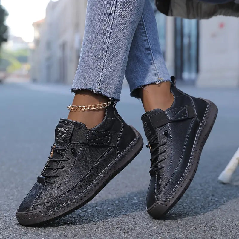 Side view of Black Mia Supportive Lightweight Cushioned Sneakers by BELLA HUDSON