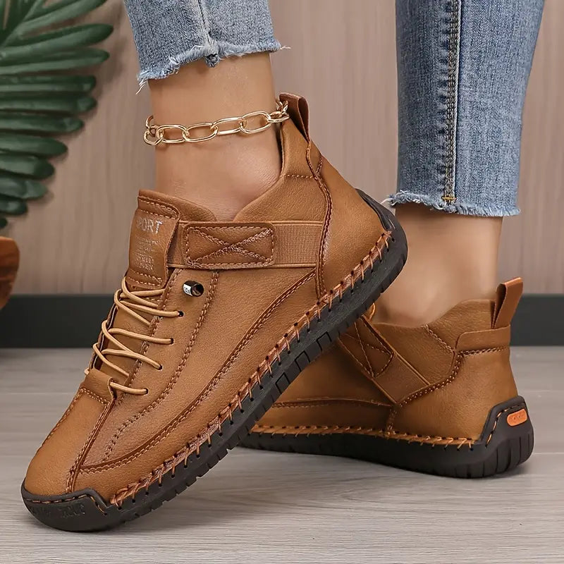 Side view of Brown Mia Supportive Lightweight Cushioned Sneakers by BELLA HUDSON