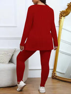 Mila Red ribbed knit two-piece set with long-sleeve side-slit tunic and matching slim-fit pants, shown from the back