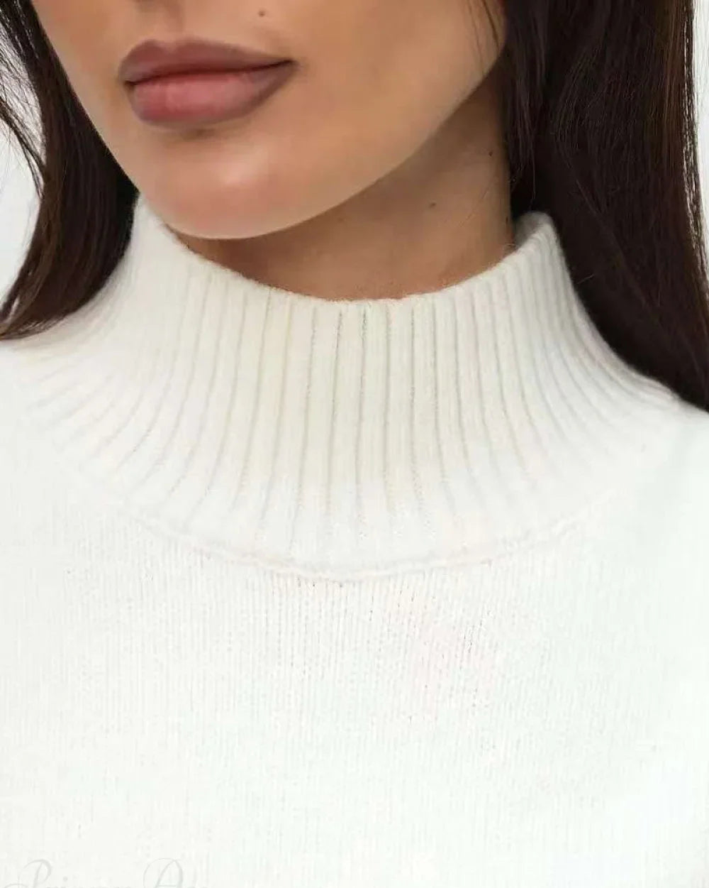 Mila White mock-neck sweater close-up of the ribbed funnel neckline.