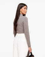 Mirelle Gray slim-fit sweater shown from the back with long sleeves and a high mock neckline.