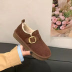 Molly plush-lined suede-look ankle boot with decorative buckle, rounded toe, and flat sole