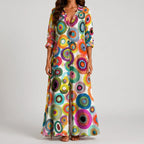 Front view of multicolor circular pattern maxi dress with vibrant print by BELLA HUDSON