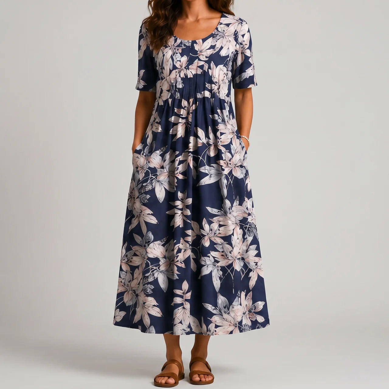 Navy floral maxi dress front view with short sleeves and pockets BELLA HUDSON
