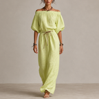 Noa Off-Shoulder Lightweight Linen Maxi Dress in light green featuring an off-shoulder neckline, lantern sleeves, adjustable waist tie, and flowing maxi-length silhouette. Designed by Bella Hudson.