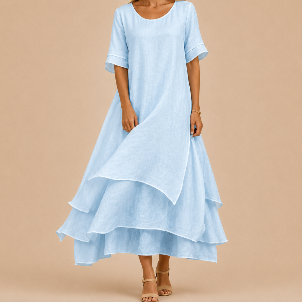 Noor Floral-Print Round-Neck Linen Midi Dress in Blue, front view featuring a lightweight layered silhouette for effortless everyday elegance. Designed by Bella Hudson.