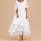 Noor Floral-Print Round-Neck Linen Midi Dress in White, front view featuring a lightweight layered linen design. Designed by Bella Hudson.