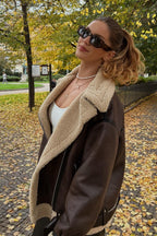 Nora Brown faux shearling aviator jacket in an upper-body view highlighting the wide lapel collar and textured trim