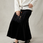 Nora corduroy maxi skirt styled with a fitted top and flared hem 