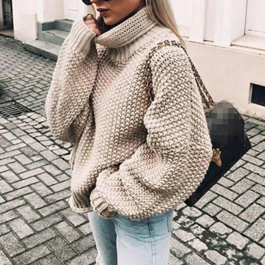 Nora Khaki chunky knit sweater featuring a folded turtleneck collar, relaxed silhouette, dropped shoulders, and balloon sleeves