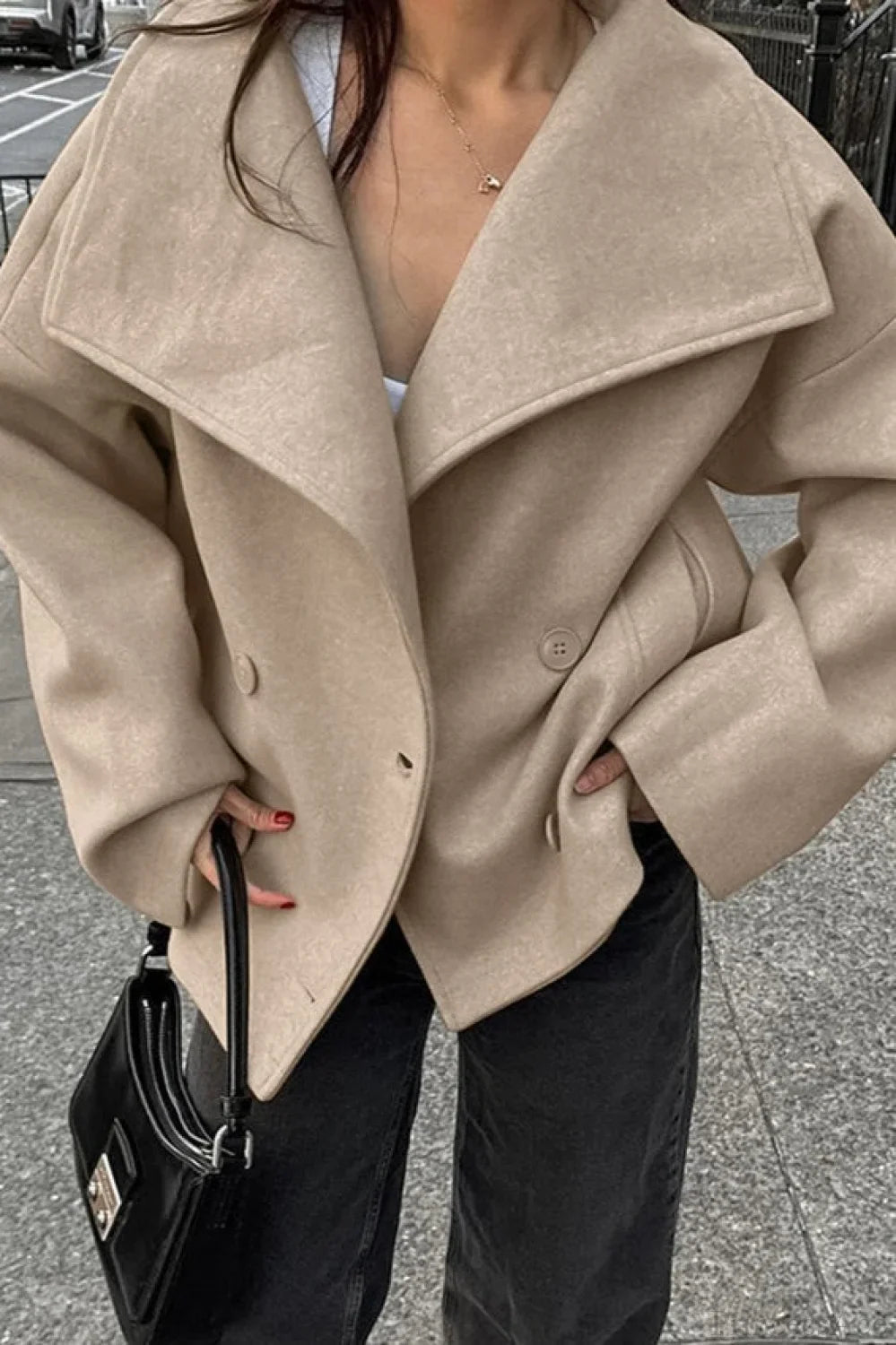 Nora Khaki cropped double-breasted jacket close-up highlighting the oversized notched lapels, double-breasted front, and relaxed fit