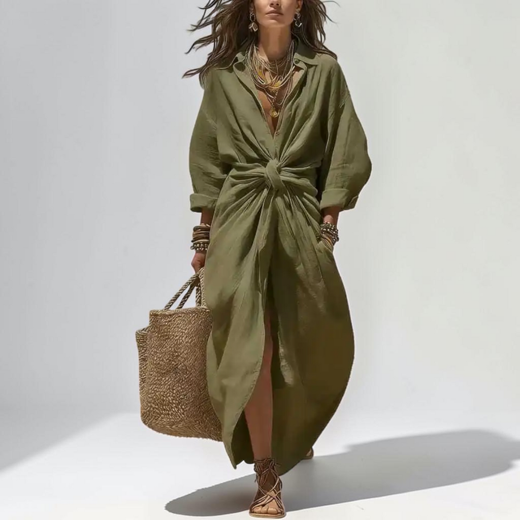 Front view of the Océane Shirt Dress Linen-Cotton Knot-Waist Maxi in green, featuring a collared neckline, button-front closure, knot-waist detail, and a flowing maxi silhouette. Designed by Bella Hudson.
