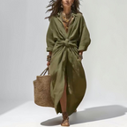 Front view of the Océane Shirt Dress Linen-Cotton Knot-Waist Maxi in green, featuring a collared neckline, button-front closure, knot-waist detail, and a flowing maxi silhouette. Designed by Bella Hudson.