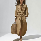Front view of the Océane Shirt Dress Linen-Cotton Knot-Waist Maxi in khaki, featuring a collared neckline, button-front closure, knot-waist detail, front slit, and relaxed linen-cotton styling. Designed by Bella Hudson.