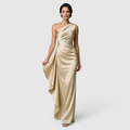 Front view of the Odessa Maxi Evening Dress Satin One-Shoulder Ruffle Style in champagne, featuring a one-shoulder neckline, ruched satin bodice, draped waist detail, and an elegant floor-length silhouette. Designed by Bella Hudson.