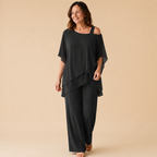 Bella Hudson Odette Two-Piece Set in Black featuring a layered cold-shoulder top and wide-leg pants, front view.