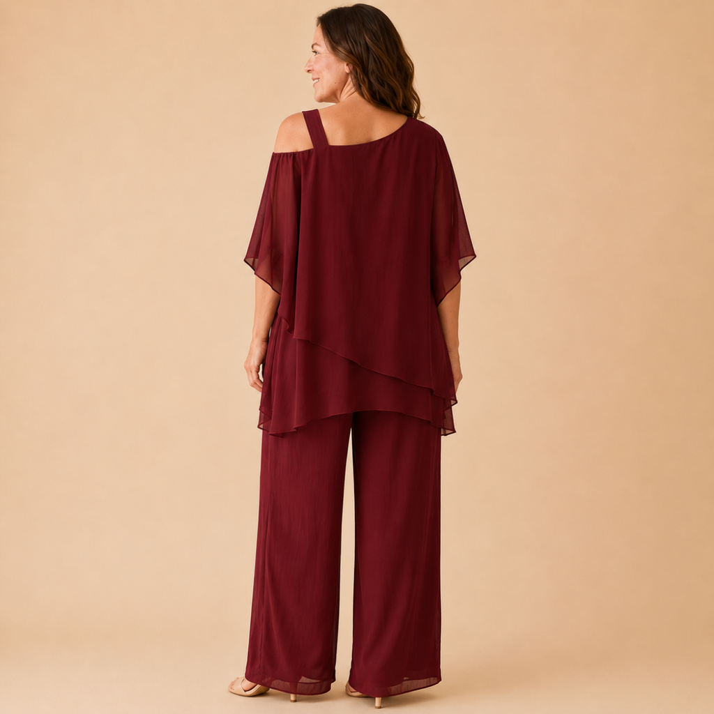 Bella Hudson Odette Two-Piece Set in Burgundy featuring a layered cold-shoulder top and wide-leg pants, back view.