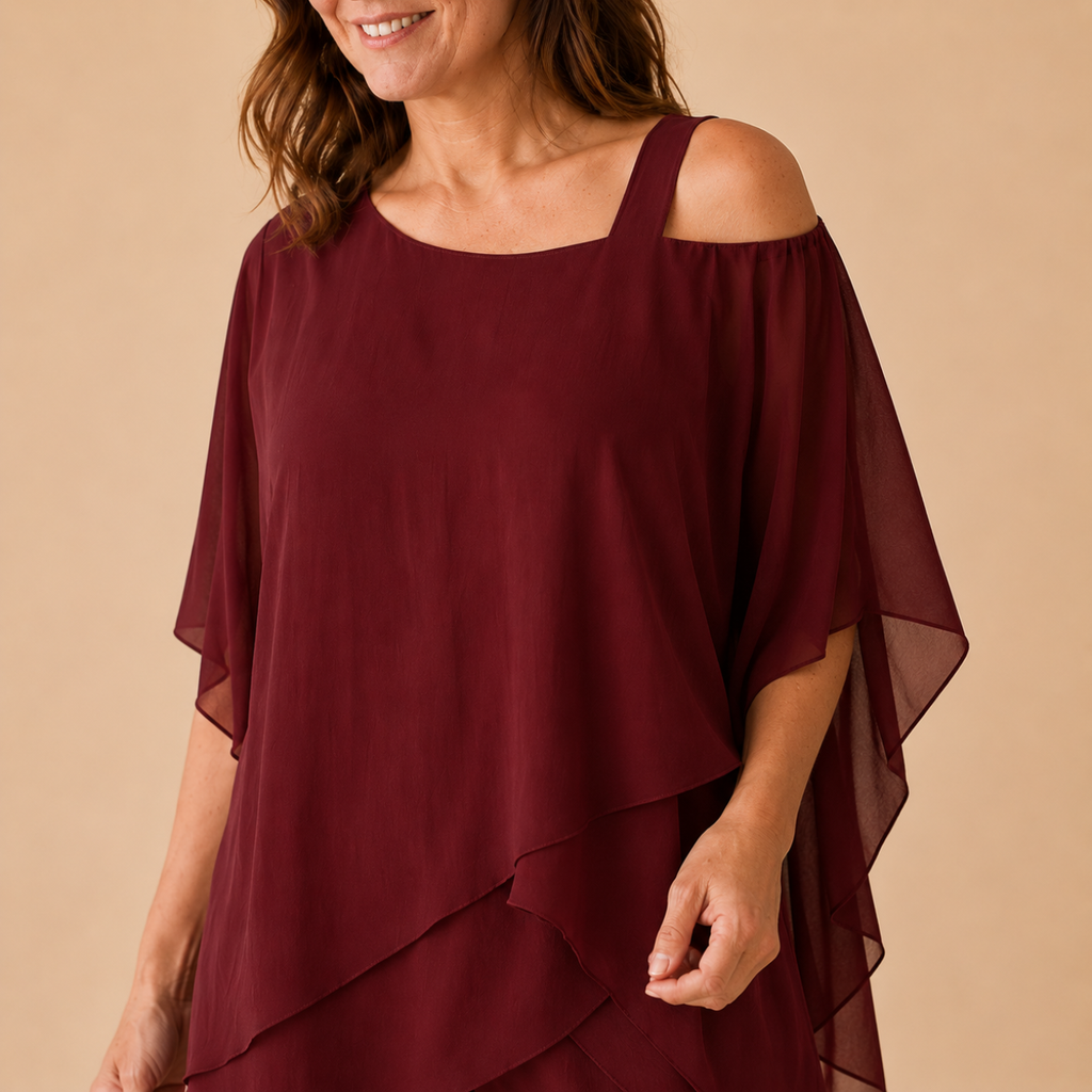 Close-up of the Bella Hudson Odette Two-Piece Set in Burgundy highlighting the layered cold-shoulder neckline and flowing fabric.