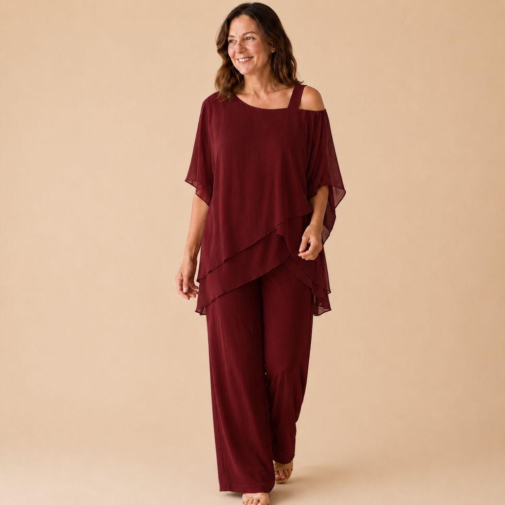 Bella Hudson Odette Two-Piece Set in Burgundy featuring a layered cold-shoulder top and wide-leg pants, front view.