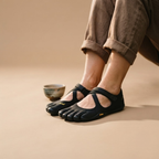 Odette Woman's Barefoot Flats Five-Toe Lightweight in Black shown in back view, featuring a flexible barefoot sole, breathable upper, ergonomic five-toe design, lightweight construction, and comfortable everyday fit, designed by Bella Hudson.