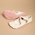 Odette Woman's Barefoot Flats Five-Toe Lightweight in Pink shown in front view, featuring an ergonomic five-toe design, breathable upper, flexible barefoot sole, wide toe box, and lightweight comfort, designed by Bella Hudson.