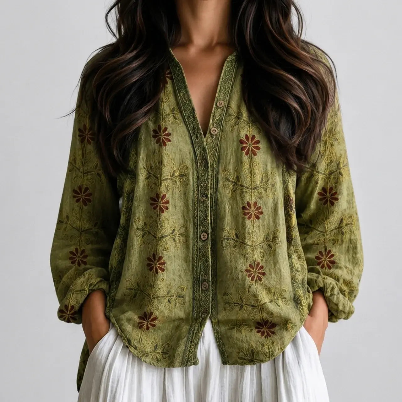 Close-up front view of olive green floral boho lightweight blouse with button front and long sleeves BELLA HUDSON.