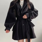 Olivia Black belted short coat featuring wide lapels, voluminous long sleeves, button-front closure, and a flared hem