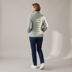 Back view of the Ondine Jacket Puffer Stand-Collar in green, highlighting the quilted construction, stand collar, and streamlined insulated silhouette. Designed by Bella Hudson.