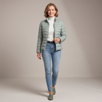 Front view of the Ondine Jacket Puffer Stand-Collar in green, featuring a stand collar, quilted puffer construction, zip-front closure, and a lightweight insulated silhouette. Designed by Bella Hudson.