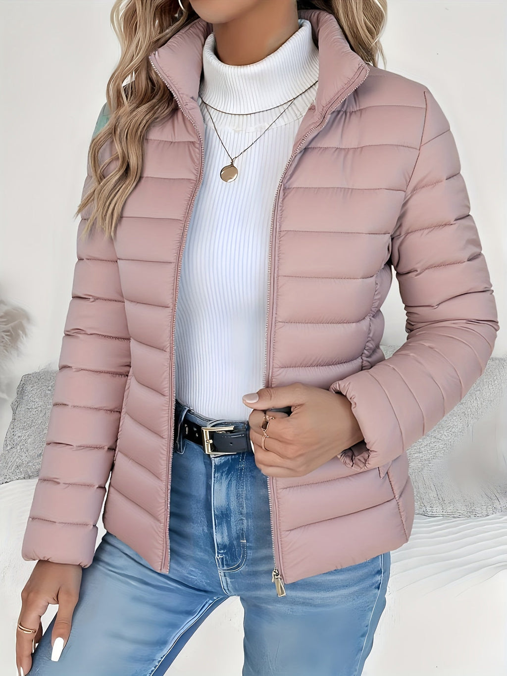 Front view of the Ondine Jacket Puffer Stand-Collar in pink, featuring a stand collar, quilted puffer construction, zip-front closure, and a lightweight insulated silhouette. Designed by Bella Hudson.