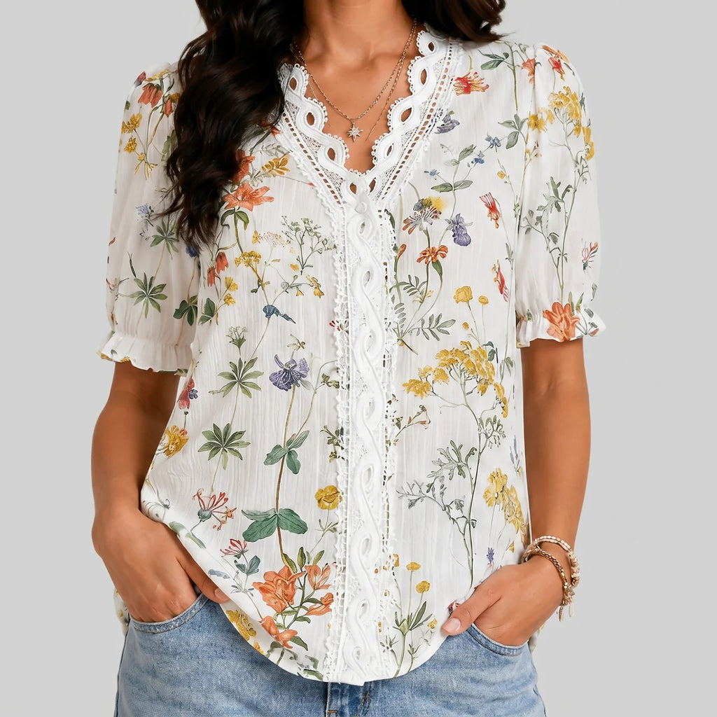 Front view of orange floral button blouse with short sleeves and relaxed fit by BELLA HUDSON