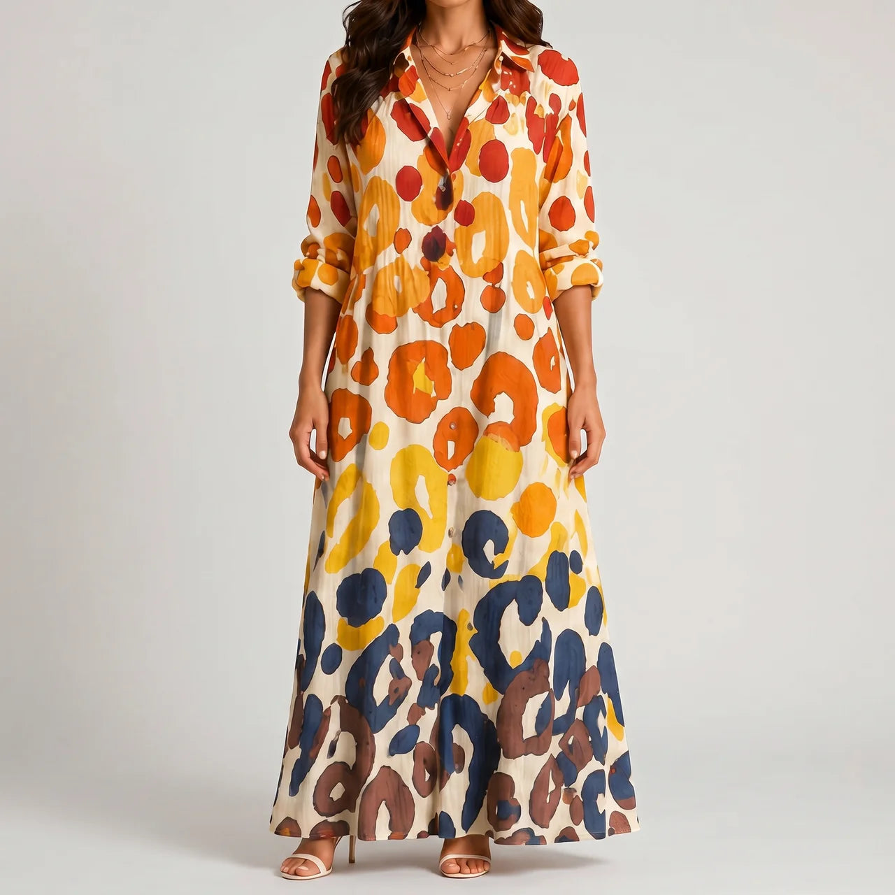 Front view of orange geometric print maxi dress with relaxed fit by BELLA HUDSON