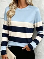 Paige Blue striped colorblock top with contrasting horizontal stripes and relaxed fit