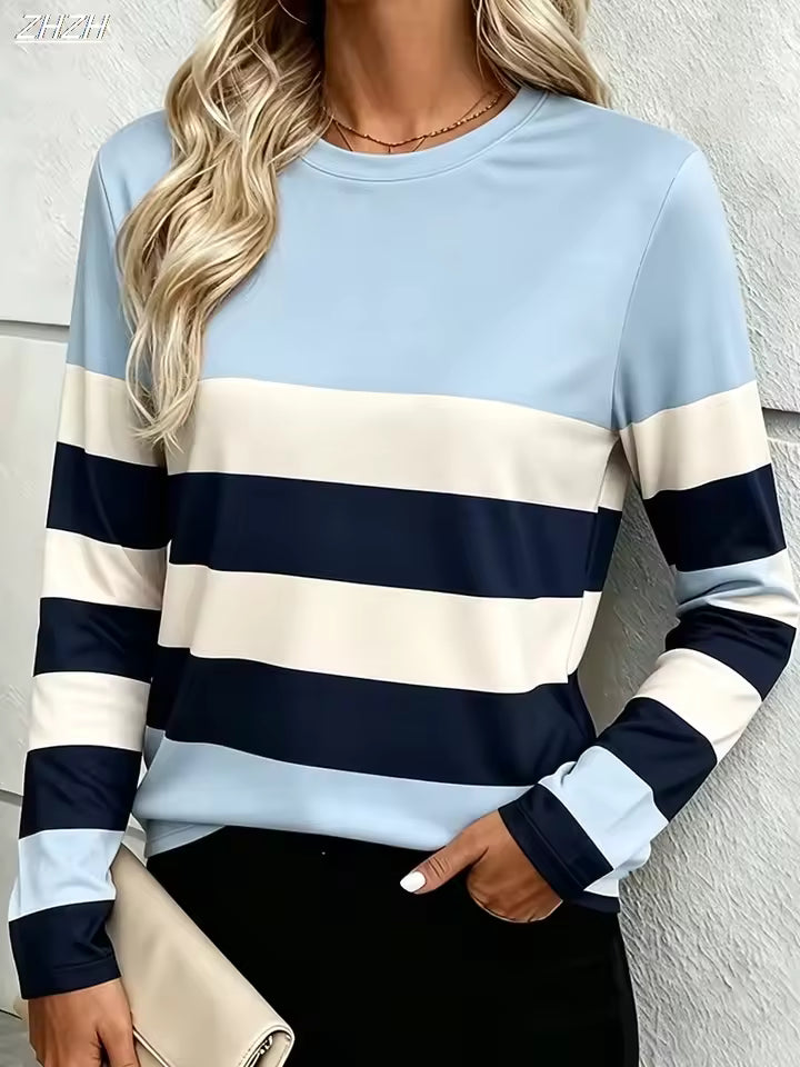 Paige Blue striped colorblock top with contrasting horizontal stripes and relaxed fit