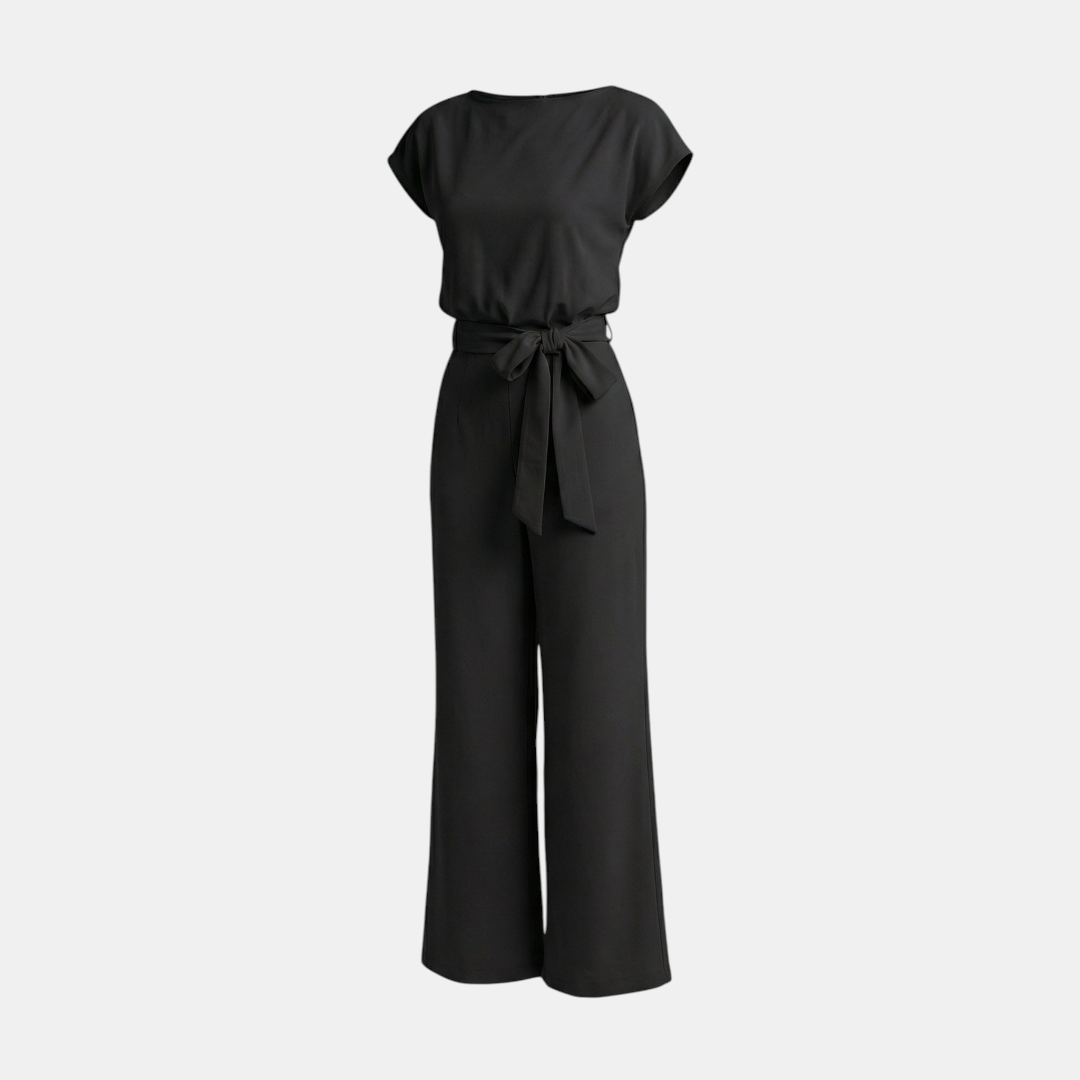 Front view of the Paloma Jumpsuit Wide-Leg Tie-Waist in black, featuring cap sleeves, a round neckline, elastic tie waist, and elegant wide-leg styling. Designed by Bella Hudson.