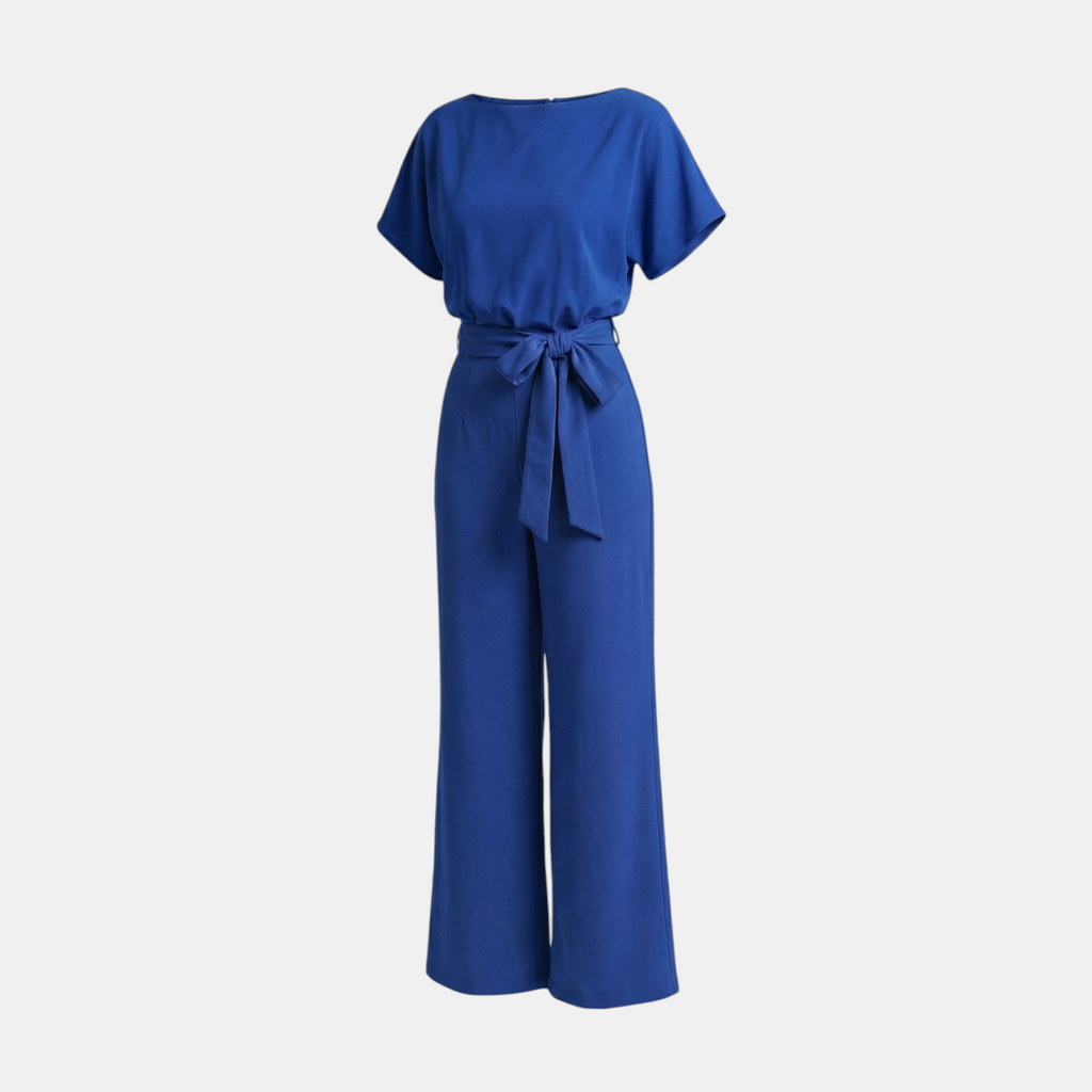 Front view of the Paloma Jumpsuit Wide-Leg Tie-Waist in blue, featuring a round neckline, cap sleeves, self-tie waist, and a relaxed wide-leg fit. Designed by Bella Hudson.