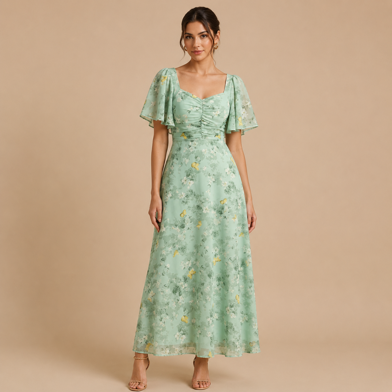 Patrice Floral Chiffon Maxi Dress with flutter sleeves in light green front view. Designed by Bella Hudson.