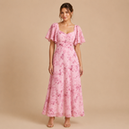 Patrice Floral Chiffon Maxi Dress with flutter sleeves in pink front view. Designed by Bella Hudson.