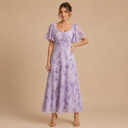 Patrice Floral Chiffon Maxi Dress with flutter sleeves in purple front view. Designed by Bella Hudson.