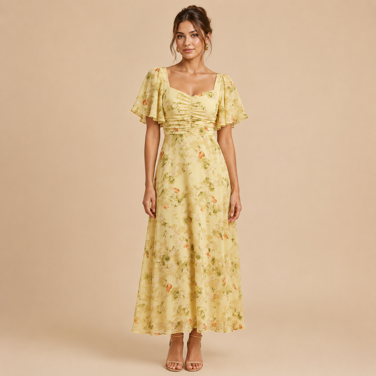 Patrice Floral Chiffon Maxi Dress with flutter sleeves in yellow front view. Designed by Bella Hudson.