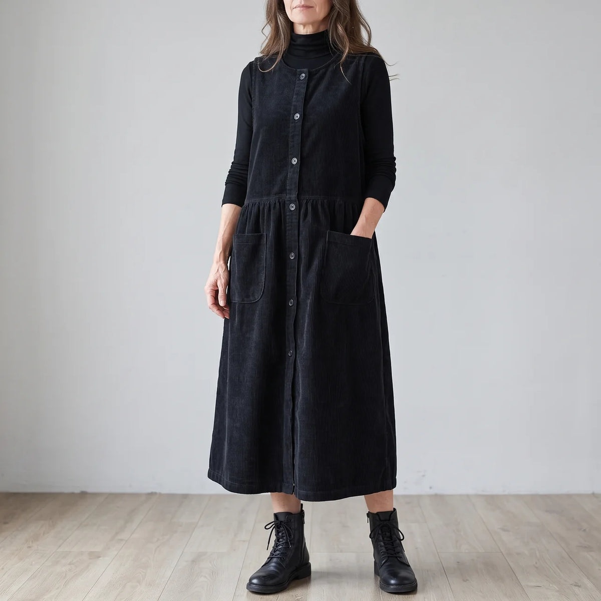 Phoebe Black corduroy pinafore midi dress with button-front detail and patch pockets