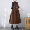 Phoebe Brown corduroy pinafore midi dress with sleeveless A-line shape and front pockets
