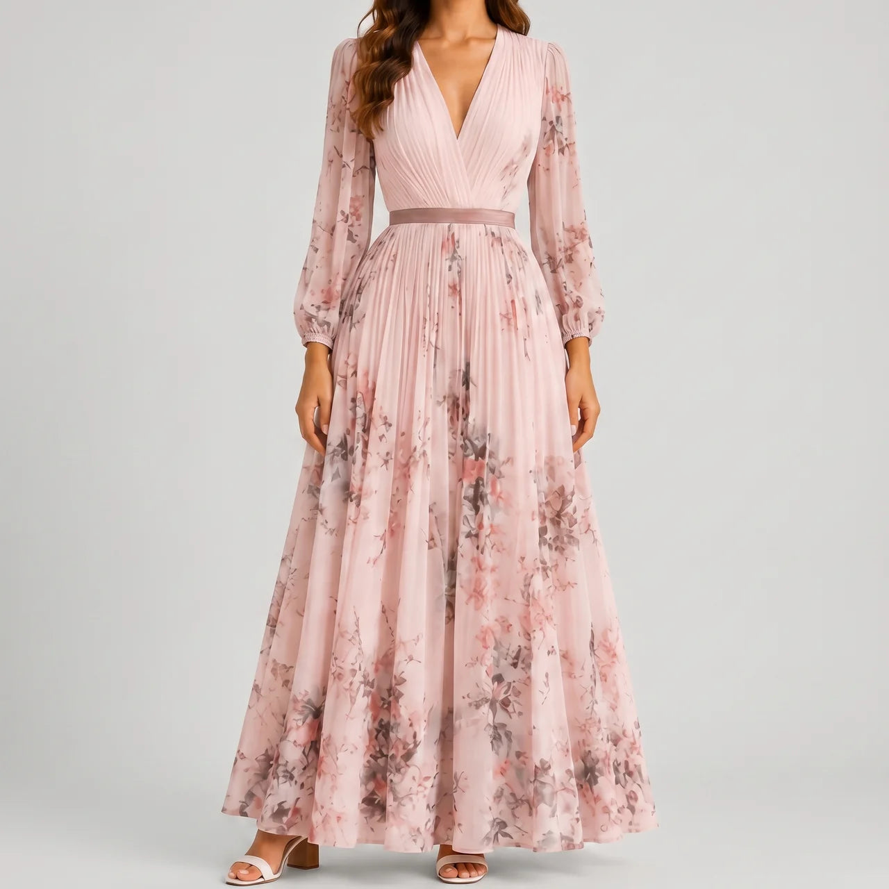Front view of pink floral V-neck maxi dress with flowy silhouette by BELLA HUDSON