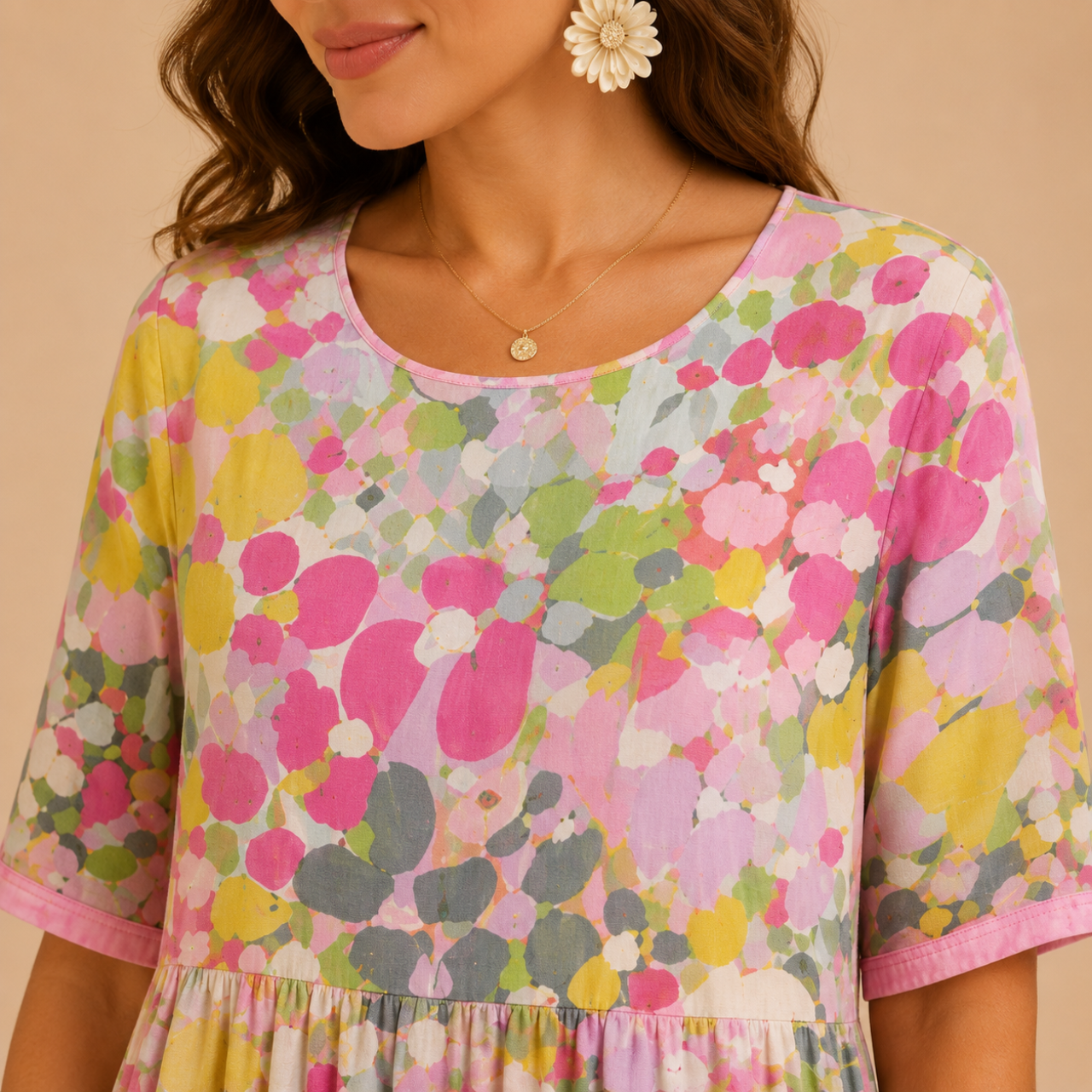Close-up view of the Primrose Floral-Print A-Line Midi Dress Lightweight in red, highlighting the vibrant floral print, round neckline, lightweight fabric, and premium craftsmanship. Designed by Bella Hudson.