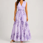 Front view of purple floral V-neck maxi dress with sleeveless design and flowy silhouette by BELLA HUDSON