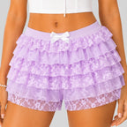 Close-up view of purple layered ruffle mini shorts with elastic waist by BELLA HUDSON
