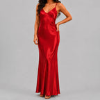 Front view of red satin maxi dress with spaghetti straps and bodycon silhouette by BELLA HUDSON