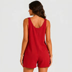 Back view of red sleeveless short jumpsuit with loose silhouette by BELLA HUDSON