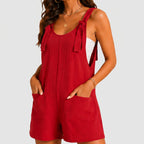 Front view of red sleeveless short jumpsuit with side pockets by BELLA HUDSON