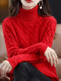 Renee Red cable-knit turtleneck sweater with ribbed collar, long sleeves, and textured knit pattern